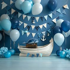 there is a boat and balloons in the room