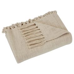 a beige blanket with fringes on it