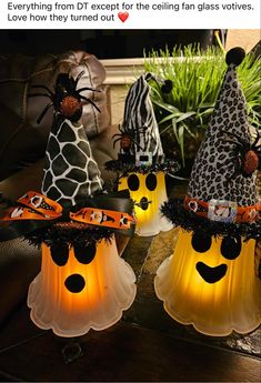 three halloween decorations on top of each other in the shape of animals and giraffes