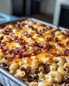 a casserole dish with meat and cheese in it