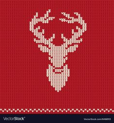 a knitted deer head with antlers in the middle on a red and white background