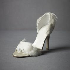 Step into elegance with our Ivory Satin Wedding Shoes. These stunning stiletto heel sandals feature delicate feather embellishments, adding a touch of glamour to your special day. Crafted from luxurious satin, these sandals offer both style and sophistication for your wedding ensemble. Color: Ivory Material: Satin Heel Type: Stiletto heel Heel Height: 4.72" / 120 mm approx Product measurements were taken using size 8. Please note that measurements may vary by size. Toe: Open toe Faux feather emb Stiletto Heels Sandals, Sandals Outfit Summer, Feather Shoes, Satin Wedding Shoes, Pencil Heels, Ballerina Heels, Heels Outfits, Heels Classy, Satin Heels