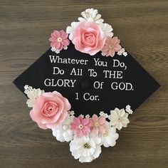 a graduation cap decorated with flowers and the words whatever you do, do all to the glory of god