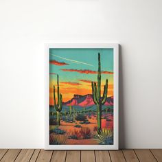 a painting on the wall of a room with a cactus and mountains in the background