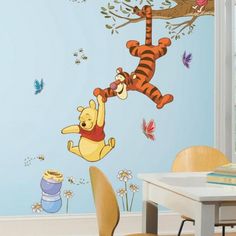 winnie the pooh and tigger wall decals in a child's room