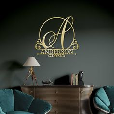 an elegant monogrammed wall decal in gold