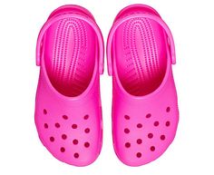 a pair of pink children's shoes on a white background