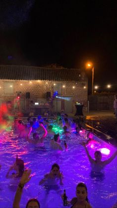 many people are in the pool at night