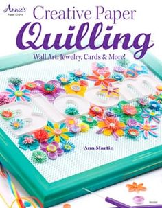 the front cover of creative paper quilting, featuring colorful flowers and crochet