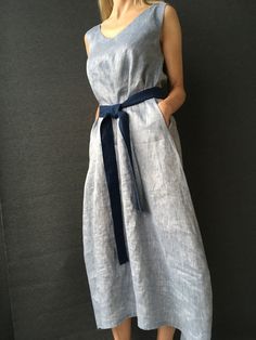 "Linen dress for women, it's elegant, minimalist, and is sure to compliment every occasion, from formal gatherings to outings with friends. Made from 100% European flax, length in front is ± 120 cm(47\"), on back 138 cm(54\") Before placing an order, check the approximate measurements given below. If you are unsure about your size or would like to adjust the length of the item, you could leave your personal measurements (height, bust, waist and hips) in a personalization box. SIZE and FIT Size X Elegant A-line Dress With Relaxed Fit, Elegant Linen A-line Maxi Dress, Elegant Linen Dress With Pockets And Relaxed Fit, Elegant Relaxed Fit Linen Dress With Pockets, Elegant A-line Linen Dress With Pockets, Spring Dresses With Pockets And Straight Neckline, Elegant Flax Linen Dress, Elegant Beach Dresses With Pockets, Long Linen Dress For Daywear