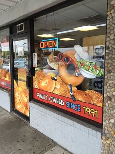 a store front with an advertisement on the window