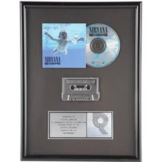 a framed cd case with an mp3 player in it