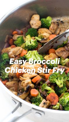 a pan filled with chicken, broccoli and carrots