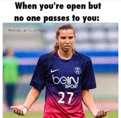 a woman in a soccer uniform is holding her hands out with the words, when you're open but no one passes to you