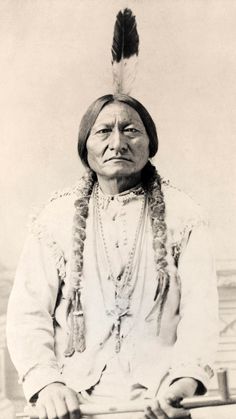 an old photo of a native american man