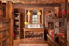 a rustic bathroom with wooden walls and flooring, including bunk beds in the center