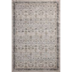 a beige and black rug with an intricate design on the bottom, in front of a white background