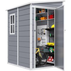 a storage shed with the door open and shelves full of various tools, including a bicycle