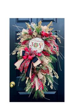 a christmas wreath hanging on the front door