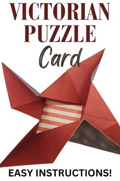 a red origami bird with the words victorian puzzle card on it's side