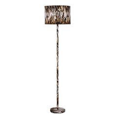 a floor lamp with a zebra print shade