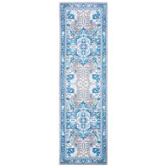 a blue and white runner rug with an ornate design on the bottom, in front of a