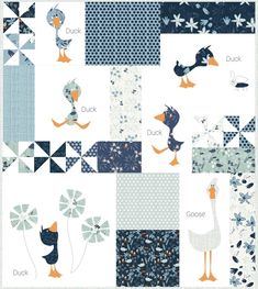 a patchwork quilt with ducks and flowers in blue, white, and grey colors