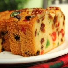 two pieces of cake sitting on top of a white plate