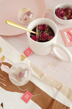 a table topped with plates and bowls filled with food