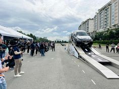 an electric car is being driven on a ramp