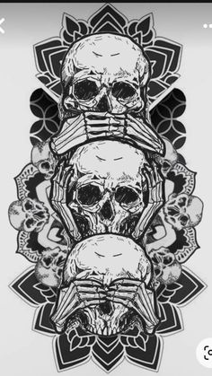 three skulls sitting on top of each other in the middle of a flowered design