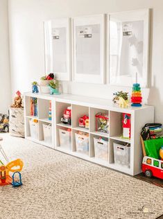 a child's playroom with toys and bookshelves