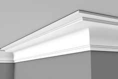 an image of a white crown molding on the wall