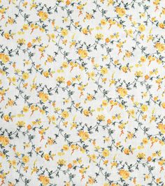 an image of yellow flowers on white fabric