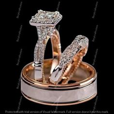 two wedding rings with diamonds on top of each other in gold and silver, set against a black background