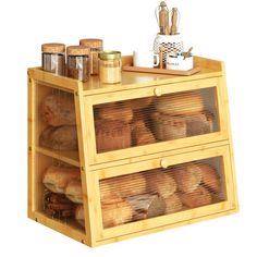 a wooden counter topped with lots of bread