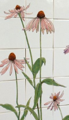 pink flowers painted on the side of a white tile wall