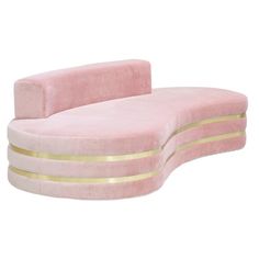 a pink couch with gold trimmings and a curved back rest in the shape of a reclining sofa