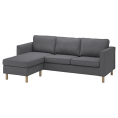 a gray sectional couch with wooden legs on an isolated white background