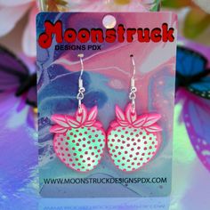 USA-made strawberry earrings! Made of lightweight durable acrylic plastic and hypoallergenic sterling silver ear hooks. Choose from hot pink iridescent or classic iridescent. Condition: New. Personally designed, laser-cut, hand-assembled. Earring Care: Acrylic is extremely lightweight and durable, but can get scratched. To avoid this, please handle your earrings with care! Avoid contact with hairspray, perfume, sweat, and water, wipe clean and store away from direct sunlight. To clean the earrin Masc Cottagecore, Strawberry Earrings, Fav Products, Fruit Summer, Uncommon Words, Kawaii Earrings, Pink Iridescent, Modern Tattoos, Strawberry Fruit