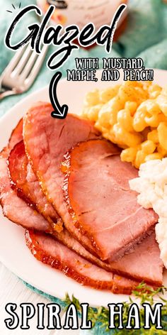 a plate with ham, macaroni and cheese on it