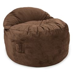 a brown bean bag chair sitting on top of a white floor