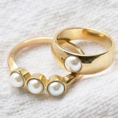 Maya Brenner x Sarah Hendler is an effortless pearl collection with pieces that feel modern, chic and not too fancy. Our Tres Pearl Ring is solid 14K yellow gold with a 2mm band and three 4mm bezel set white pearls. Please allow 2-3 weeks for processing Ring Pearl Modern, Pearl Rings Vintage, Metalsmith Jewelry, Emerald Rings, Pearl Collection, Pearl Jewellery, Gold Piece, Stone Setting, Timeless Jewelry