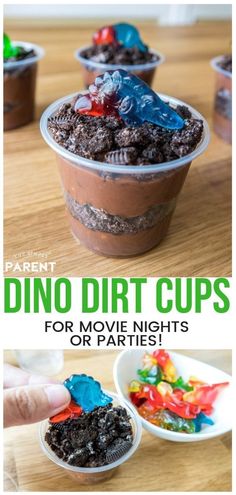 two cups filled with dirt next to each other on top of a wooden table and the words dino dirt cups for movie nights or parties