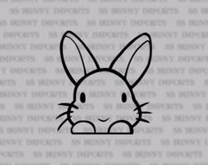 a bunny face with ears on it's head is shown in black and white