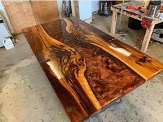 a table made out of wood in a room