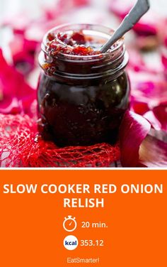 slow cooker red onion relish in a jar with a spoon on the side