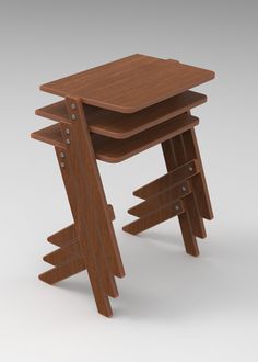 three wooden stools stacked on top of each other