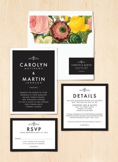 an assortment of wedding stationery with flowers on it