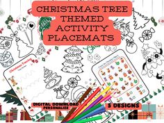 christmas tree themed activity placemats with pencils and crayons on top